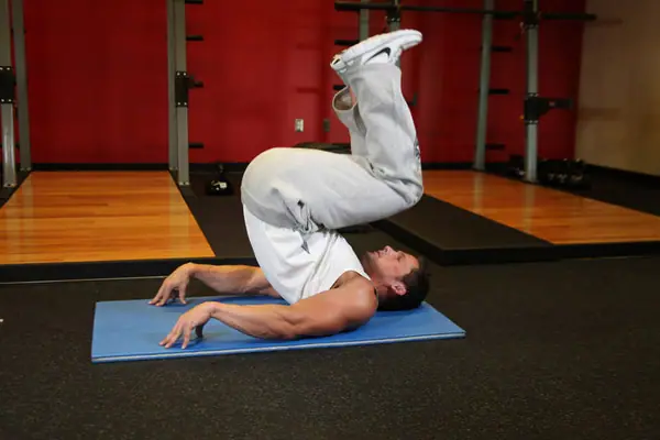 Abdominales inversos: posición final