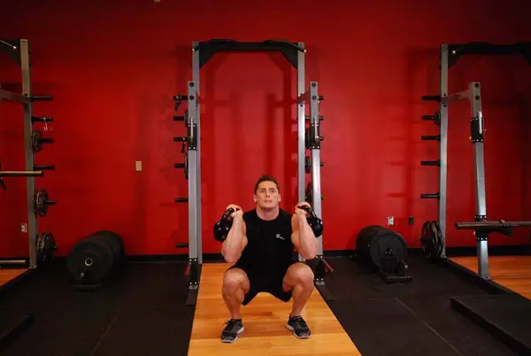 Thruster con pesa rusa: posición final